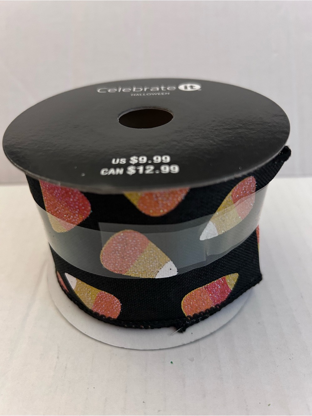 Celebrate It Black wired Ribbon with Glitter Candy Corn Print 2-1/2”